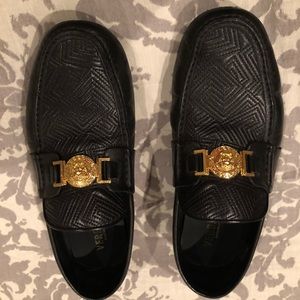Versace black leather loafer.